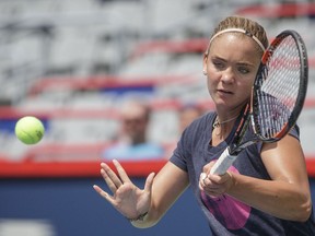 Sixteen-year-old Canadian tennis player Charlotte Robillard-Millette hits a return during a practice session ahead of the Rogers Cup Tennis Tournament at Uniprix Stadium in Montreal on July 22, 2016.