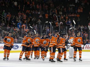 The Edmonton Oilers salute the crowd following their 7-3 win over the Winnipeg Jets at Rogers Place in Edmonton on Sept. 20, 2018.