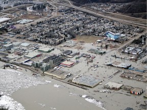 Flooded sections of downtown Fort McMurray as seen from the air on Monday, April 27, 2020.