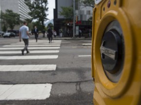 Beg buttons at 56 intersections in the city's core are being deactivated Thursday in response to COVID-19. (Postmedia, File)