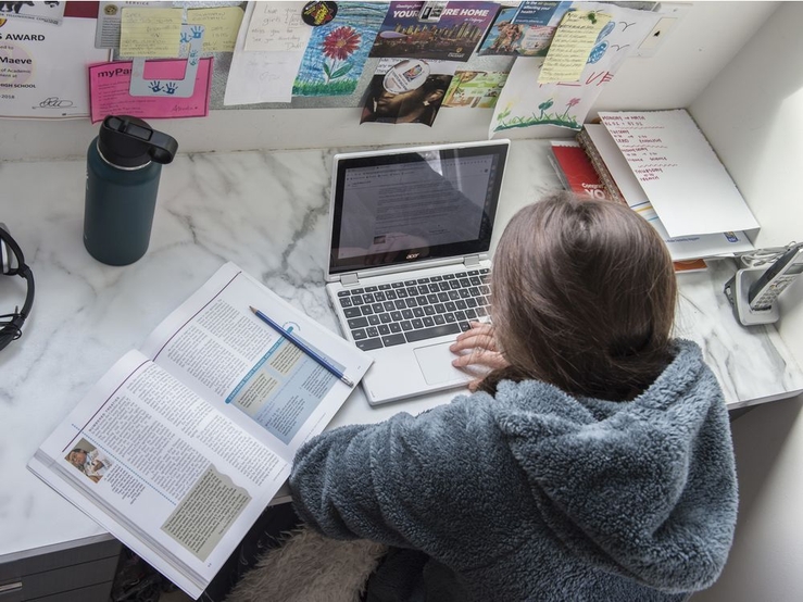 High school students in Edmonton have begun learning from home from with their school teachers using programs like Zoom and Google Hangouts in the wake of the school year cancelled by COVID-19 on March 31, 2020. Photo by Shaughn Butts / Postmedia