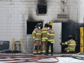 Firefighters on the scene of a fire at the Italian Bakery on 97 Street near 106 Avenue where two people were taken to hospital on the morning of Friday, April 3, 2020.