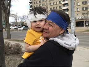 Kavana Starr, 2, and her grandfather, John Starr, after she was released from hospital on Thursday, April 23, 2020. Kavana Starr was attacked by a coyote in Coronation Park in west Edmonton on Tuesday, April 21, 2020.