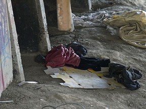 A makeshift shelter under the Jasper Avenue bridge at 91 Street in downtown Edmonton on April 29, 2020. The city has suspended enforcement of homeless camps during the COVID-19 pandemic.