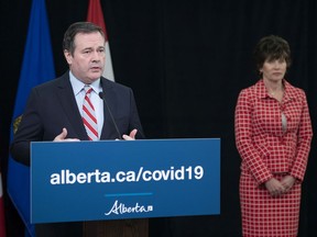 Premier Jason Kenney and Energy Minister Sonya Savage announce a new rehabilitation program to cleanup inactive wells and pipelines, including remediation and reclamation, the removal of abandoned in-place pipelines or Phase 1 and 2 environmental site assessments, during a press conference in Edmonton Friday, April 24, 2020.