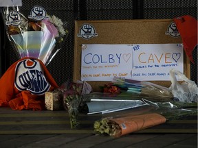 A memorial for Edmonton Oilers forward Colby Cave outside Rogers Place, in Edmonton Sunday April 12, 2020.