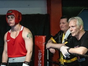 (Right to left) Rick Cooper, Jody Wheaton and Reid Twohey with Cougar Boxing Club are seen during a Cougar Boxing Club Club Cards "Basement Wars II" match at Boys & Girls Clubs Big Brothers Big Sisters (Macauley Area). The club is celebrating its 50th anniversary.