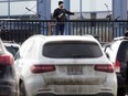 Pastor Ryan Pedde leads a Bridge Church Easter Sunday drive-in service, in the parking lot outside the Fort Saskatchewan Dow Centennial Centre Sunday April 12, 2020.