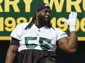 Edmonton Eskimos offensive lineman SirVincent Rogers stretches at training camp on Monday, May 20, 2019.