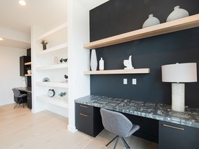 Dual workspaces help keep a little distance between projects in Kanvi Homes' Bespoke Onyx, a finalist in the category of Best Single Family $700,000 to $850,000, CHBA-Edmonton Region's 2020 Awards of Excellence in Housing.