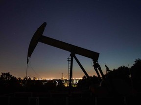 An oil pumpjack operates at dusk Willow Springs Park in Long Beach, California. President Donald Trump on Tuesday ordered his administration to come up with a plan to aid U.S. oil companies struggling with a massive supply glut and record-low crude prices.