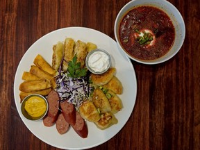 The Ukrainian feast at Glass Monkey Gastropub includes perogies, kubasa, cabbage rolls, pancakes filled with cottage cheese, borscht and cornmeal polenta.  Larry Wong/Postmedia