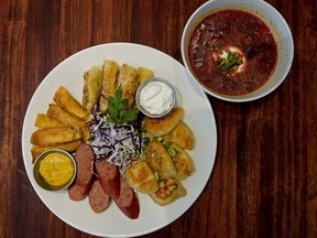 The Ukrainian feast at Glass Monkey Gastropub includes perogies, kubasa, cabbage rolls, pancakes filled with cottage cheese, borscht and cornmeal polenta. Larry Wong/Postmedia
