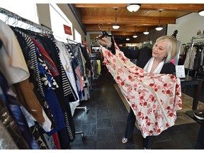 Mavis Bergquist re-opened her consignment shop, Good Stuff, just before the long weekend as Edmonton retailers take tentative steps back into businesses.