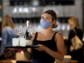 Masks must be worn by Earls staff as the restaurant boosts safety protocol during COVID-19.