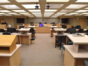Courtroom B201, in the basement of the Edmonton courthouse, was built in the early 2000s for a gang trial that is widely considered a boondoggle. The courtroom is enjoying a second act during COVID-19.