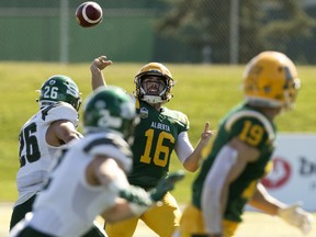 University Alberta Golden Bears quarterback Brad Launhardt (16) looks to pass to Tanner Buchanan (19) during first half Canada West action against the University of Saskatchewan Huskies at Foote Field on Sept. 21, 2019.