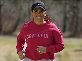 Former Canadian Olympic pairs figure skating champion Jamie Salé runs near her home in Edmonton on May 1, 2020. The Alberta Cancer Foundation launched a virtual 5K run with her as ambassador.