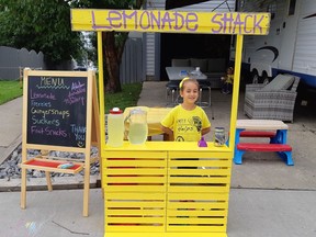 Bella Rose Desrosiers mans her lemonade Shack