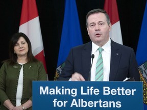 Premier Jason Kenney and Alberta Education Minister Adriana LaGrange, left, provide details about Bill 15, the Choice in Education Act during a news conference from Edmonton on Thursday, May 28, 2020.