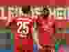 Alphonso Davies celebrates scoring Bayern Munich's fourth goal during their game against Eintracht Frankfurt on Saturday.