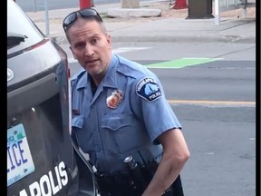 In this file still image taken on May 25, 2020, from a video courtesy of Darnella Frazier via Facebook, shows Minneapolis police officer Derek Chauvin during the arrest of George Floyd. Chauvin has been arrested on May 29, 2020, days after Floyds fatal arrest that sparked protests, rioting and outcry across the city and nation.