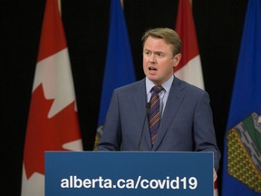 Health Minister Tyler Shandro announces the temporary expansion of Calgary's Peter Lougheed Centre, creating 100 care spaces for patients during the COVID-19 pandemic, at a press conference in Edmonton Thursday April 9, 2020. Photo by David Bloom