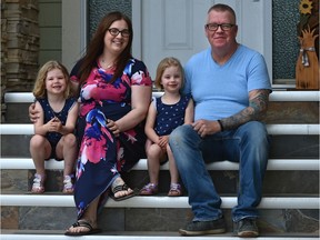 Morgana Naclia with her husband Murray and their four-year-old twins, Odelia, left, and Eloise. Morgana is president of the Edmonton Twin and Triplet Club which just celebrated National Multiple Births Awareness Day 2020.