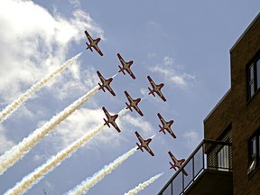 The Canadian Forces Snowbirds aerobatic team fly over Edmonton on Friday May 15, 2020. They are on a cross-Canada mission dubbed Operation Inspiration to salute Canadians doing their part to fight the spread of COVID-19. (Photo by Larry Wong/Postmedia)
