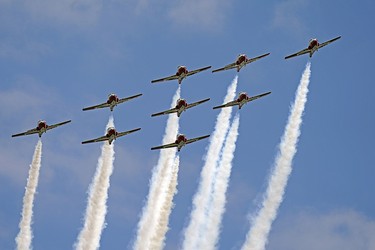 The Canadian Forces Snowbirds aerobatic team flies over Edmonton on May 15, 2020. They are on a cross-Canada mission dubbed Operation Inspiration to salute Canadians doing their part to fight the spread of COVID-19.