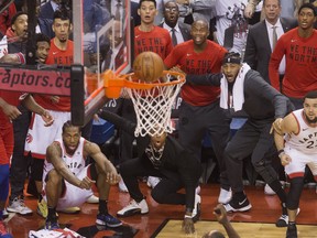 Former Raptor Kawhi Leonard watches as his game-winning ball goes in to clinch the series against the 76ers last year.