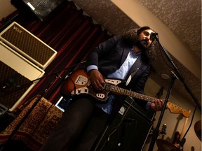 Arsh Khaira, who wrote the protest song Blood Diamonds, performs in his home studio.