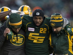 The Edmonton Eskimos return man Christion Jones (22) is helped off the field after being injured against the Saskatchewan Roughriders at Commonwealth Stadium in this file photo from Oct. 26, 2019.