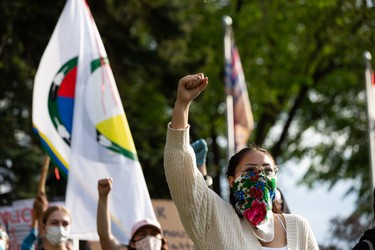 Demonstrators cheer during the A Fight for Equity rally at the Alberta Legislature in Edmonton, on Friday, June 5, 2020. The demonstration follows worldwide Black Lives Matter protests set off by the May 25 death of George Floyd in Minneapolis, Minnesota. Police officer Derek Chauvin has been charged with murder after Floyd died during an arrest where Chauvin knelt on his neck for nine minutes. Photo by Ian Kucerak/Postmedia