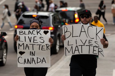 Demonstrators take to the streets during the A Fight for Equity rally at the Alberta Legislature in Edmonton, on Friday, June 5, 2020. Drivers honked their horns as demonstrators called out for equality and justice. Photo by Ian Kucerak/Postmedia