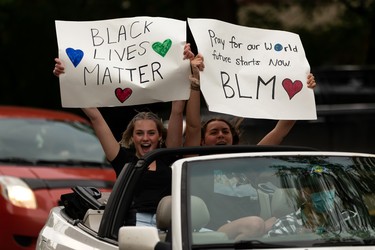 Demonstrators take to the streets during the A Fight for Equity rally at the Alberta Legislature in Edmonton, on Friday, June 5, 2020. Drivers honked their horns as demonstrators called out for equality and justice. Photo by Ian Kucerak/Postmedia