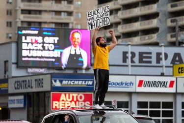 Demonstrators take to the streets during the A Fight for Equity rally at the Alberta Legislature in Edmonton, on Friday, June 5, 2020. Drivers honked their horns as demonstrators called out for equality and justice. Photo by Ian Kucerak/Postmedia