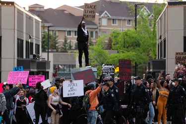 Demonstrators protest at 109 Street at Jasper Avenue after leaving the A Fight for Equity rally at the Alberta Legislature in Edmonton, on Friday, June 5, 2020. Drivers honked their horns as demonstrators called out for equality and justice. Photo by Ian Kucerak/Postmedia