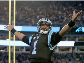 Cam Newton #1 of the Carolina Panthers reacts after a 4th quarter touchdown against the Tampa Bay Buccaneers during their game at Bank of America Stadium on January 3, 2016 in Charlotte, North Carolina.