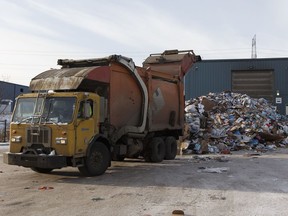 Twelve workers at the City of Edmonton's recycling plant have tested positive for COVID-19, prompting the facility to close indefinitely.