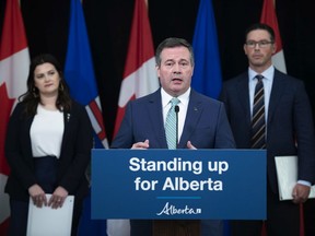 Premier Jason Kenney and Minister of Justice and Solicitor General Doug Schweitzer announced, during a news teleconference from Edmonton on Wed., June 3, 2020, two new initiatives to improve firearms governance and enforcement in Alberta. Michaela Glasgo, MLA for Brooks-Medicine Hat, at left in the picture, will chair the Alberta Firearms Advisory Committee.