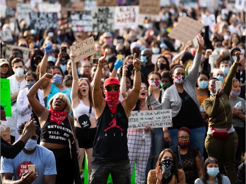 One charged after police vehicle window smashed following massive