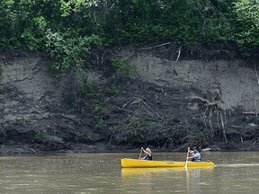 We all paddle in my yellow canoe, navigating down the North Saskatchewan River in Edmonton, June 18, 2020.