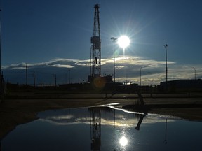 An oil derrick in a yard at the Nisku industrial park in Edmonton, June 24, 2020.