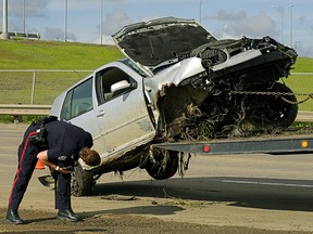 Police were investigating after a driver went down an embankment from Anthony Henday Drive, landing on Parsons Road, June 18, 2020.