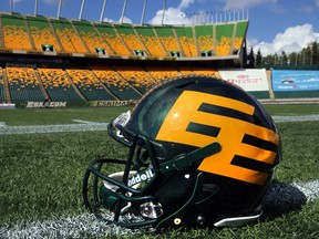 A helmet sits on the sidelines during an Edmonton Eskimos' practice at Commonwealth Stadium in Edmonton, Alberta. File photo.