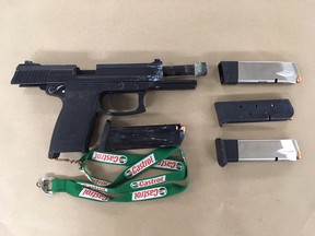 Police seized a stolen handgun and three ounces of meth after executing two search warrants in the Parkland area.