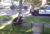 An Edmonton police officer is seen jumping with his knee onto a man lying on the ground during a 2019 arrest.