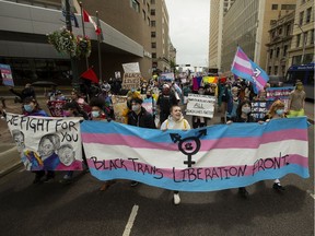 Protesters march from Beaver Hills Park to Churchill Square during the Stonewall Anniversary March in Edmonton on Sunday, June 28, 2020. This year's event focused on the Black Lives Matter movement and specifically Black Trans Lives Matter.