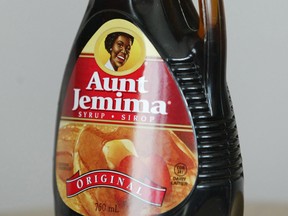 The Aunt Jemima logo on a bottle of pancake syrup.